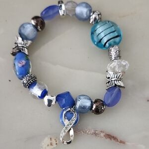Avon Blue, Silver Tones Butterfly Infinity Charm Beaded Stretch Bracelet